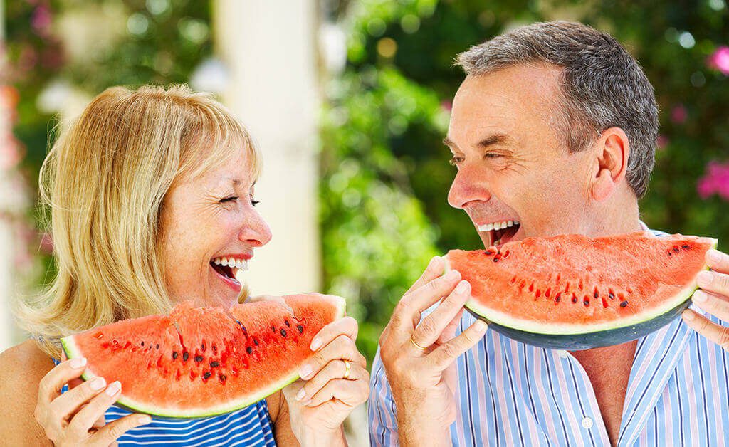couple eating watermelon