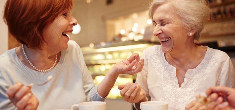 senior friends at a cafe